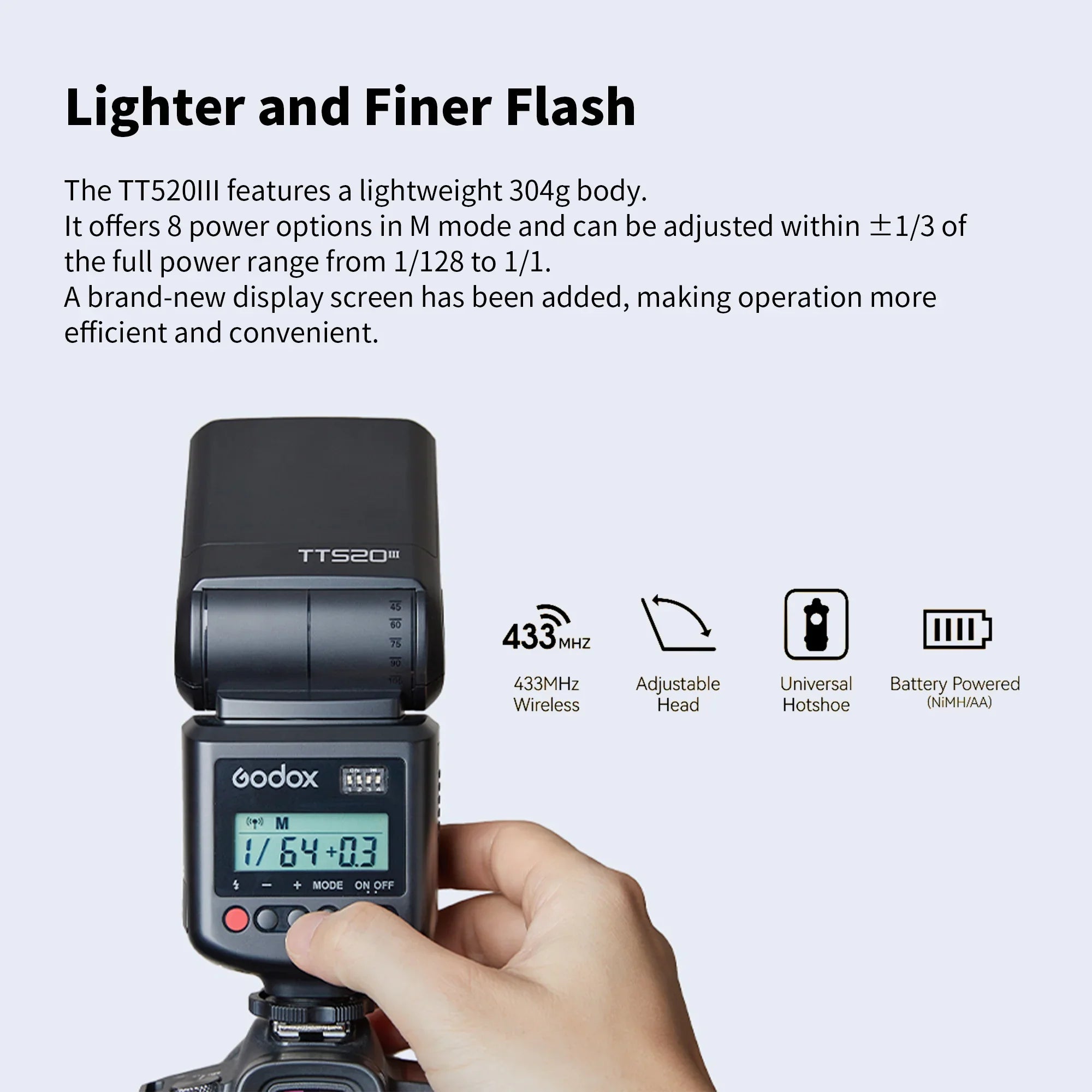 Hand adjusting Godox TT520III camera flash showing LCD screen and features like 433MHz wireless and adjustable head